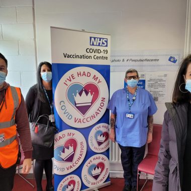 Liz Kendall with three staff and volunteers from the Peepul Centre vaccination centre in Leicester