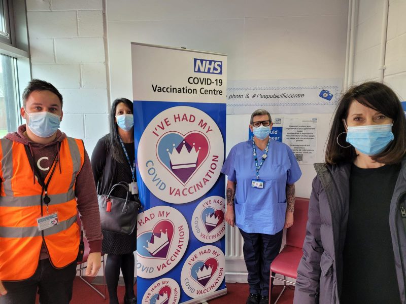 Liz Kendall with three staff and volunteers from the Peepul Centre vaccination centre in Leicester